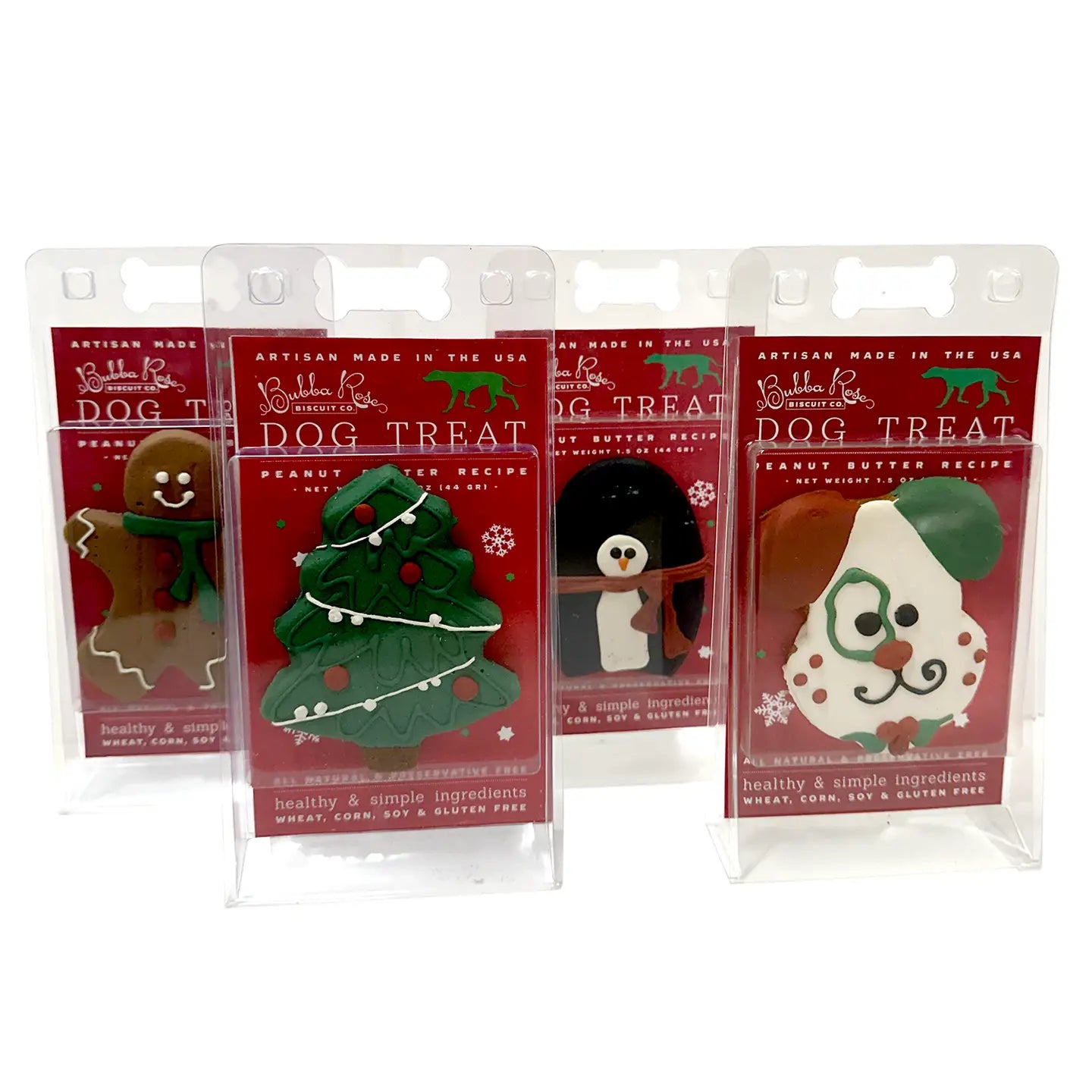 Four packages of dog treats with Christmas-themed graphics on a white background
