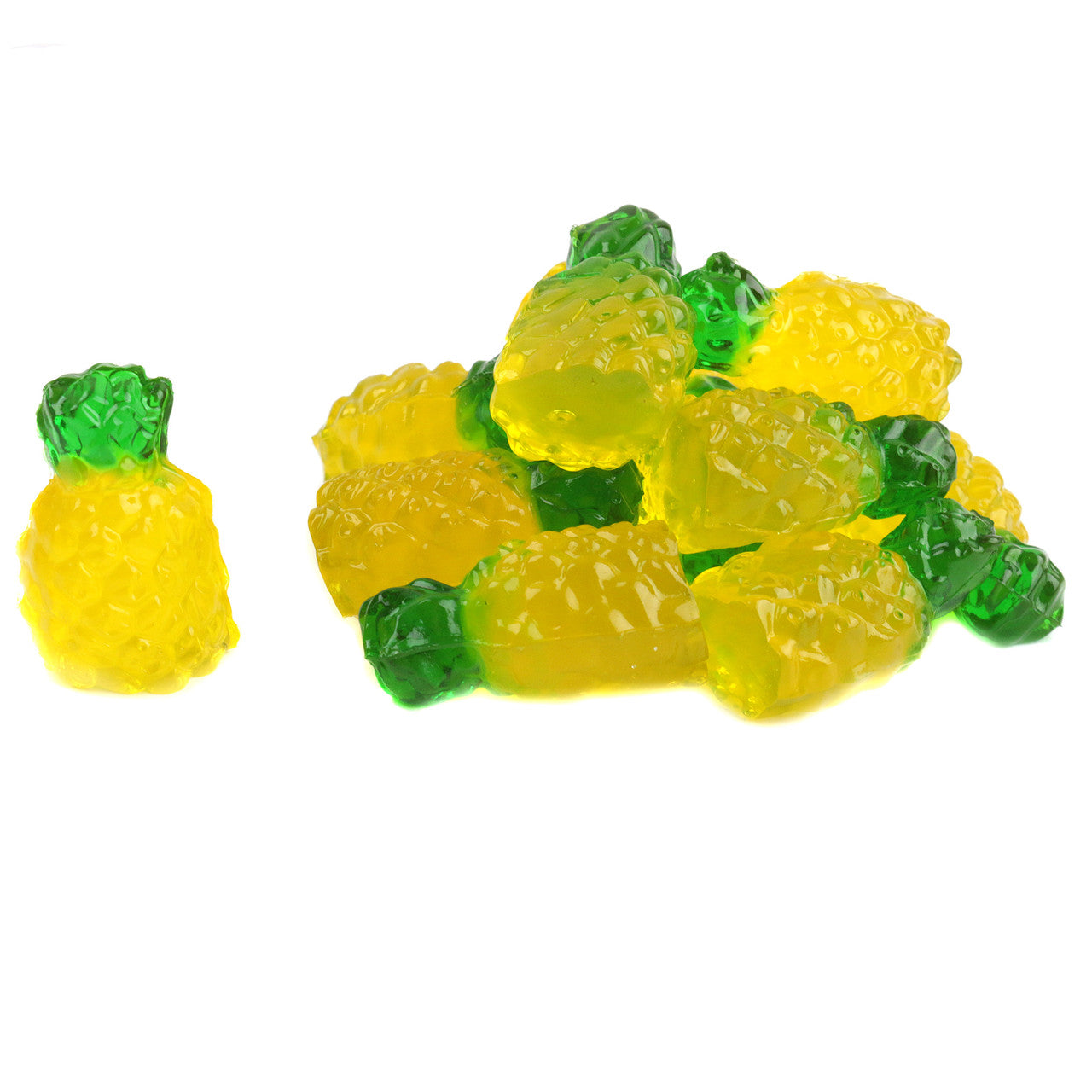 Yellow pineapple-shaped gummy candies with green bases on a white background
