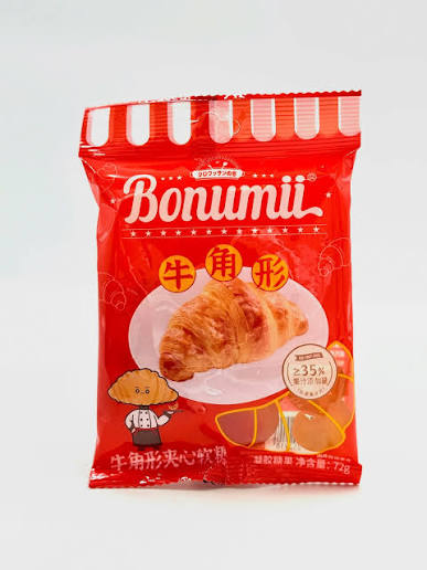 Red package of Bonumii croissant-shaped gummies on a white background