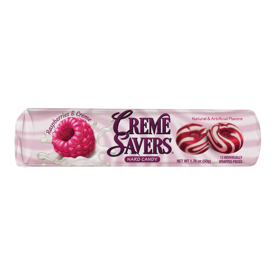 A tube of Creme Savers Hard Candy in Raspberry & Creme flavor, featuring a pink and white striped design with illustrations of a raspberry and two red-and-white striped lollipops on a white background