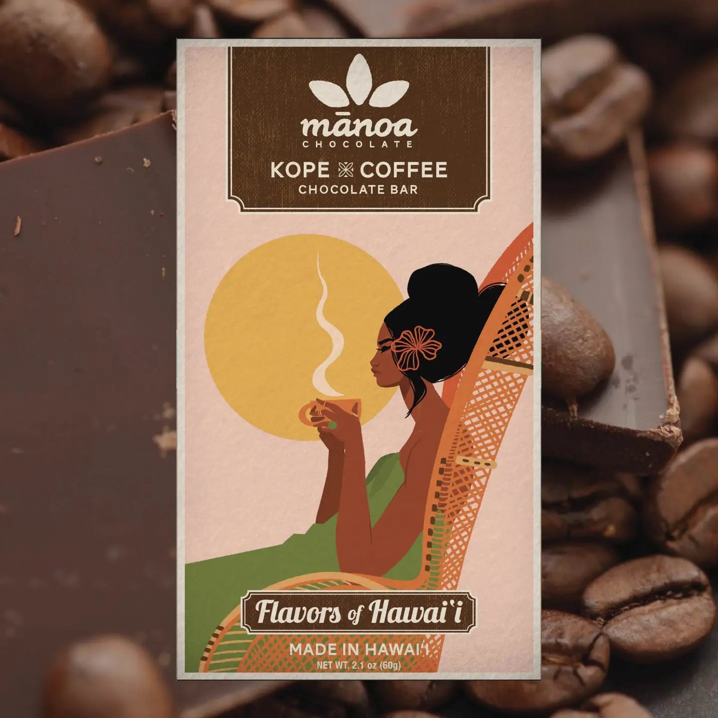 Manoa Chocolate Kope Coffee chocolate bar packaging with coffee beans in the background