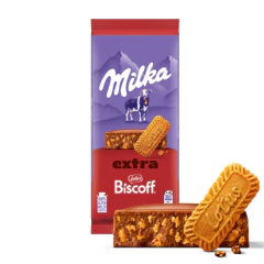 Milka extra Biscotti chocolate biscotti with milk powder, shown in its purple and red packaging alongside two biscotti cookies and a few crumbs on a white background