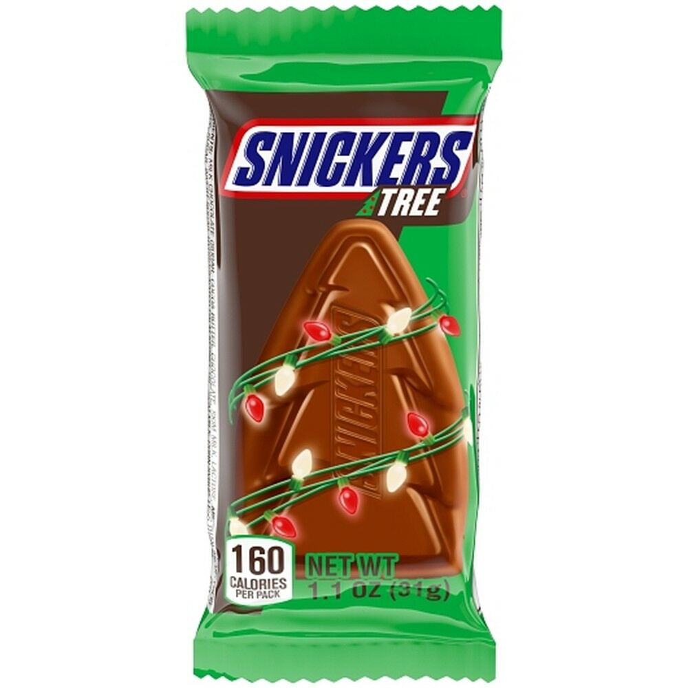 Snickers candy bar packaging with Christmas lights and decorations on a white background