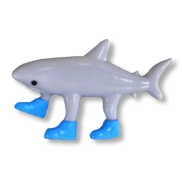 Shark toy figure with blue boots on a white background
