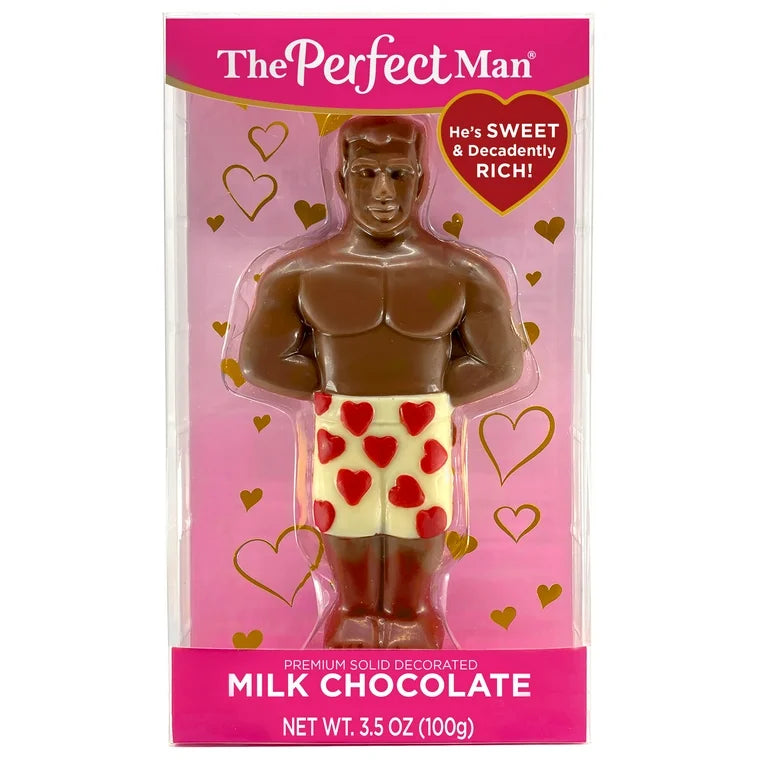 Chocolate figurine in packaging with pink background and 'The Perfect Man' branding