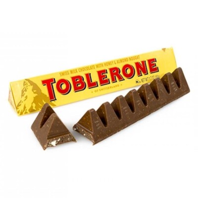 Toblerone chocolate bar with packaging on a white background