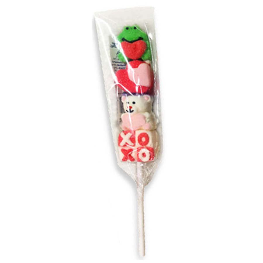 Kabob with a teddy bear, frog, and heart design in a clear cone on a white background